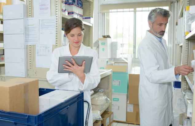 nurses tracking Batch/Lot inventory in a medical stockroom